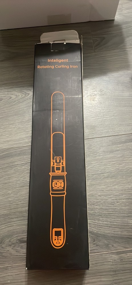 Smart rotating curling wand with auto-rotate technology