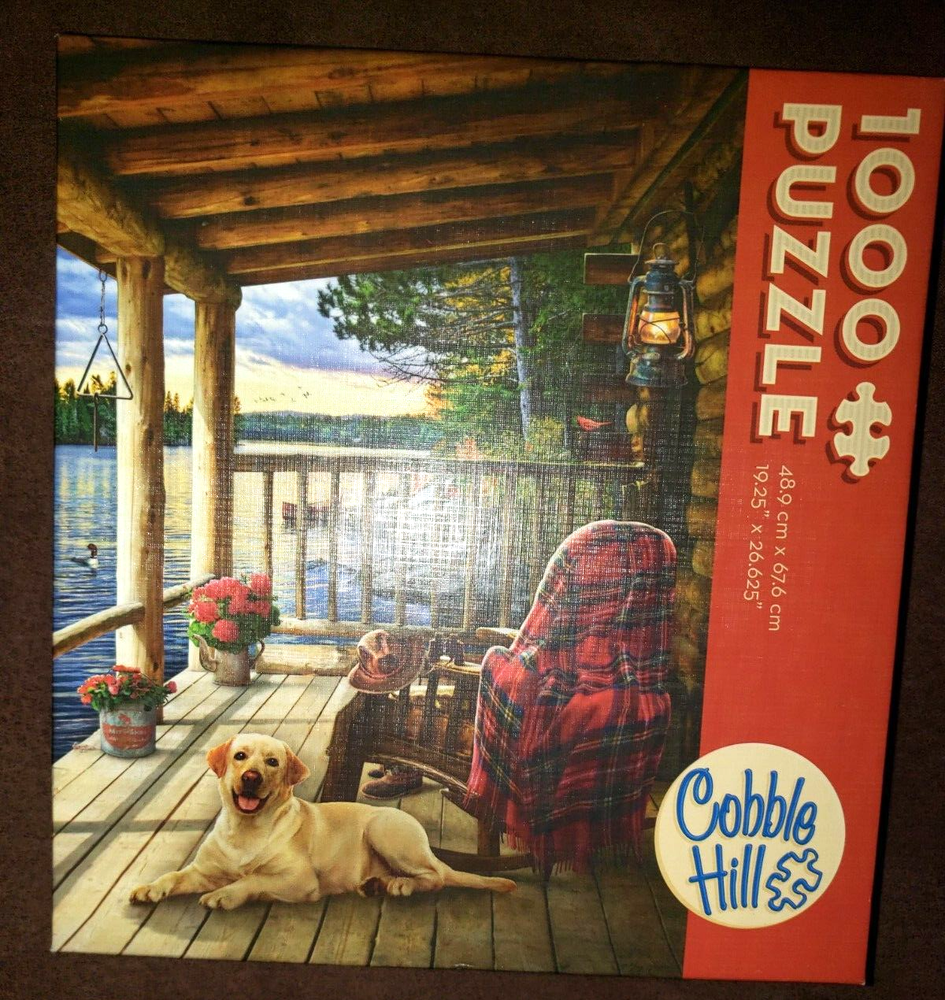 1000 PC JIGSAW PUZZLE COBBLE HILL DOG ON CABIN PORCH ROCKING CHAIR LAKE NICE!