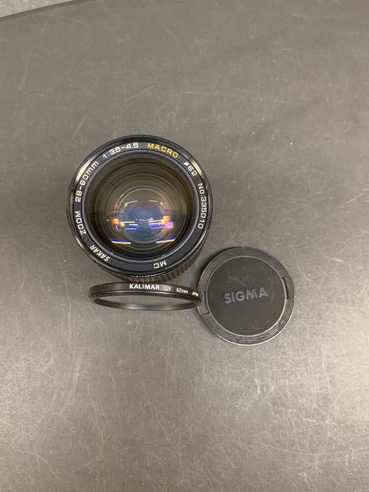 Sakar Macro Auto Focus Zoom 28-80mm 1:3.5-4.5 Lens + Kalimar UV Filter -Untested