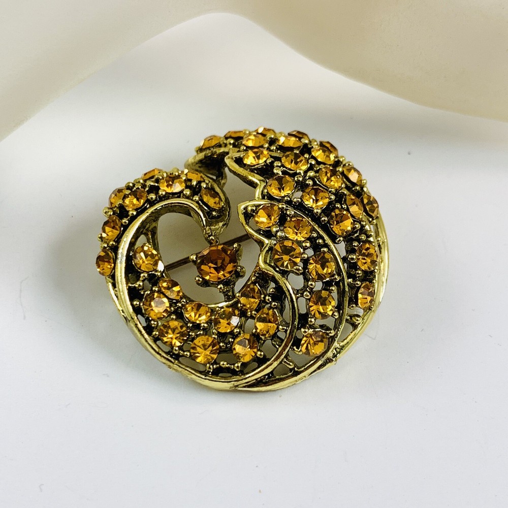 Vintage gold tone yellow rhinestone brooch pin with sparkly details