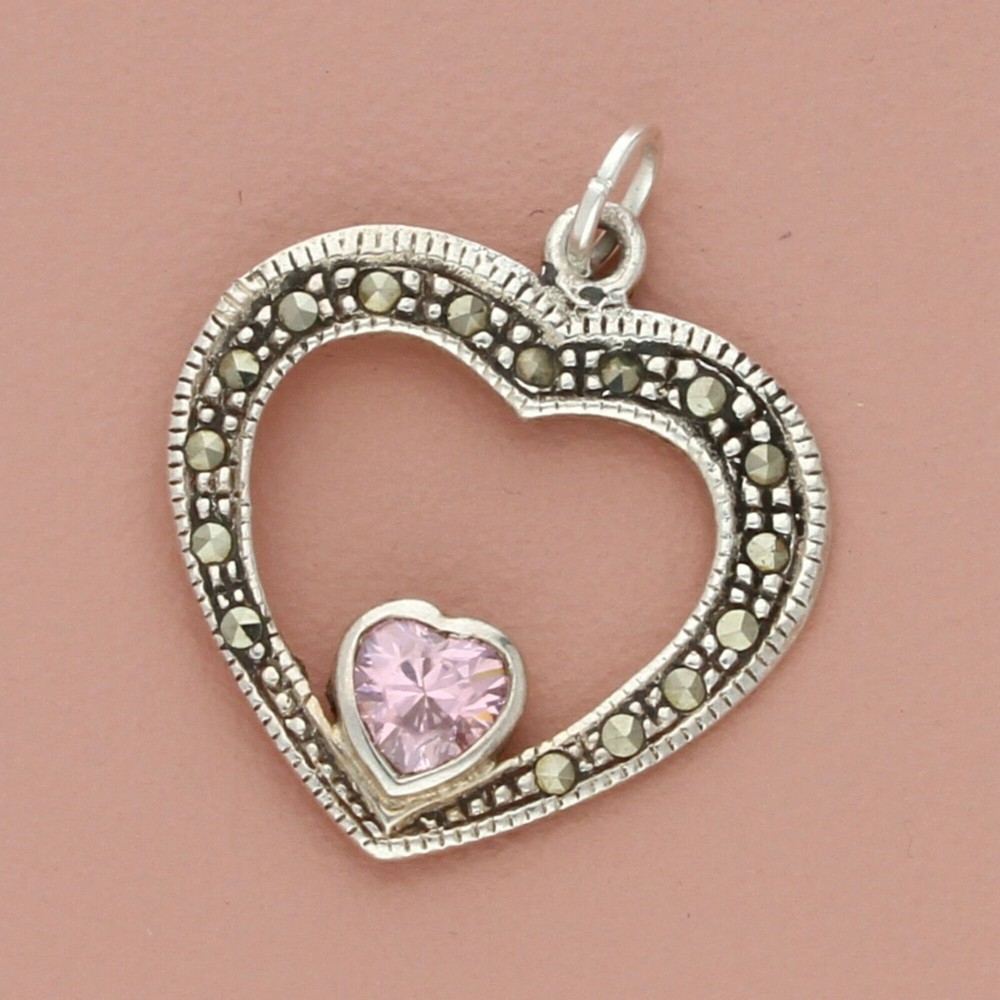 Sterling silver marcasite and pink CZ heart pendant with studded details  