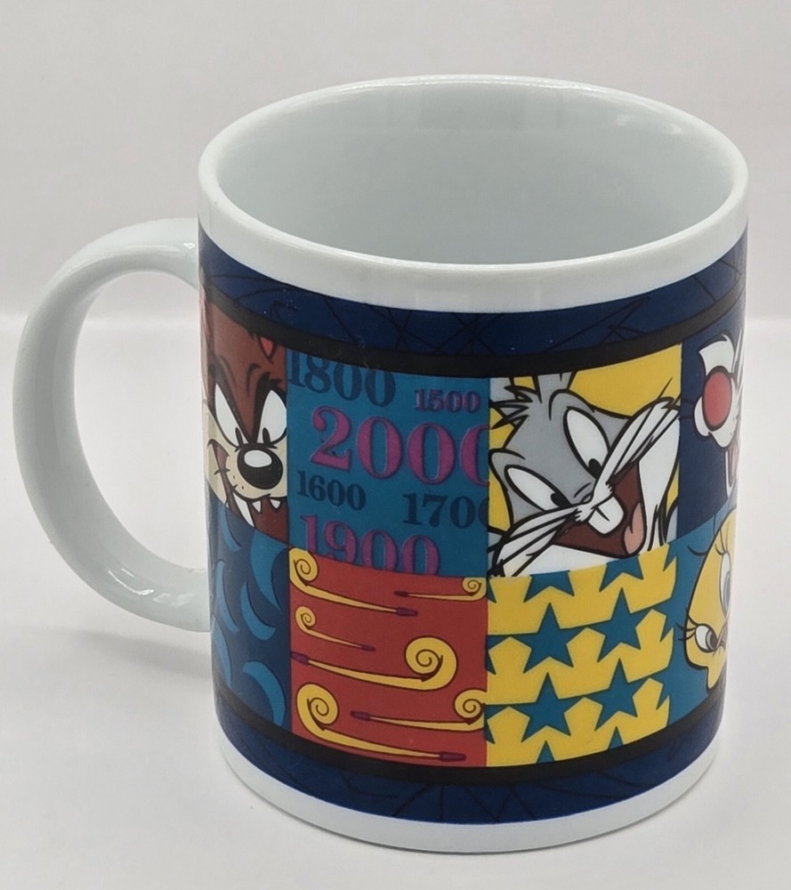VTG 1999 Looney Tunes Warner Bros Coffee Mug featuring Bugs Tweety Daffy Sylvester & Taz