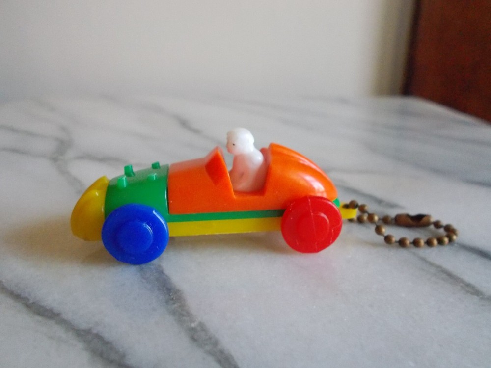 Vintage LIONAL Plastic  Puzzle Race Car / 2 3/4