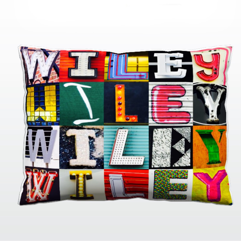 Personalized Pillow featuring the name WILEY in photos of actual sign letters