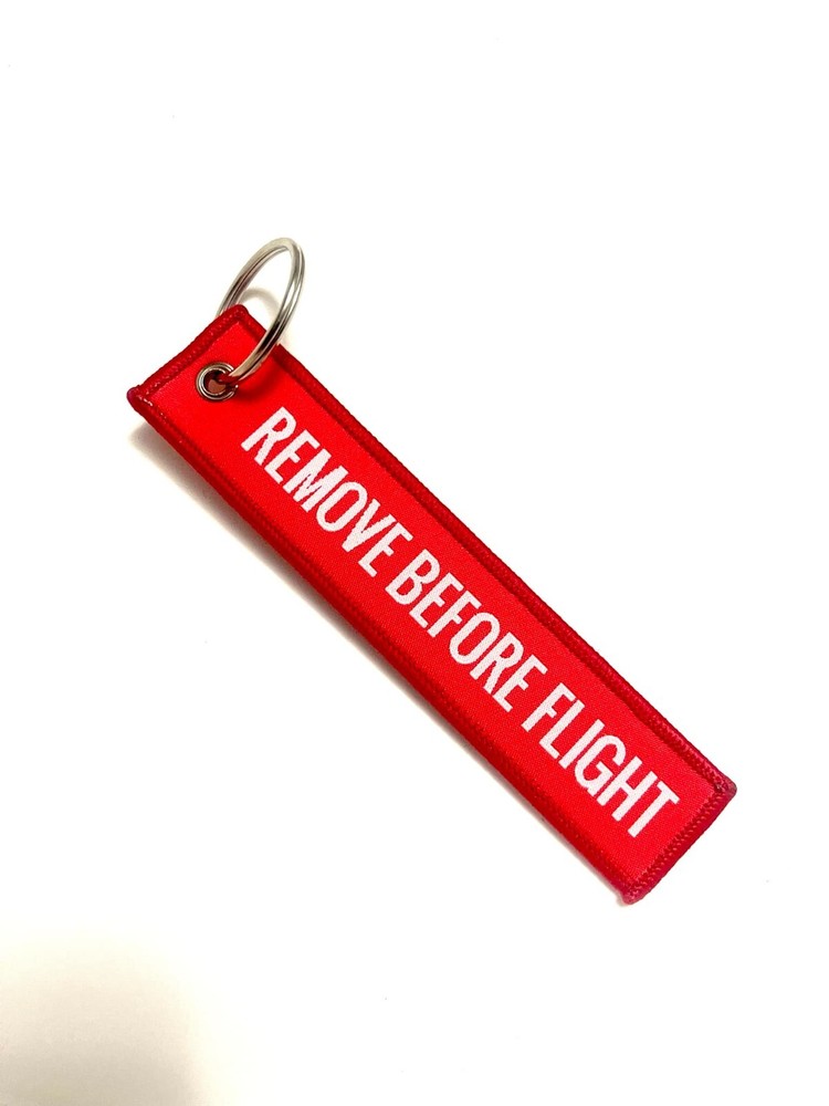 Remove Before Flight key tags with rings