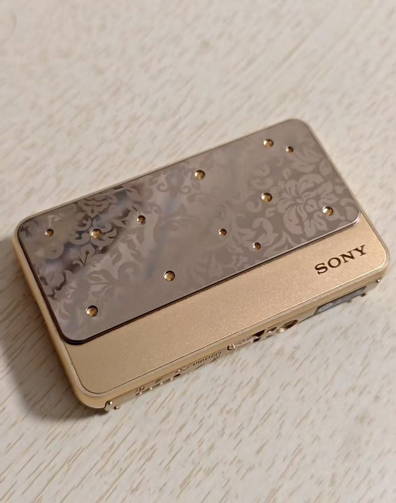 SONY Cyber Shot DSC-T99 14.1MP 4x Optical Zoom Digital Camera English Gold