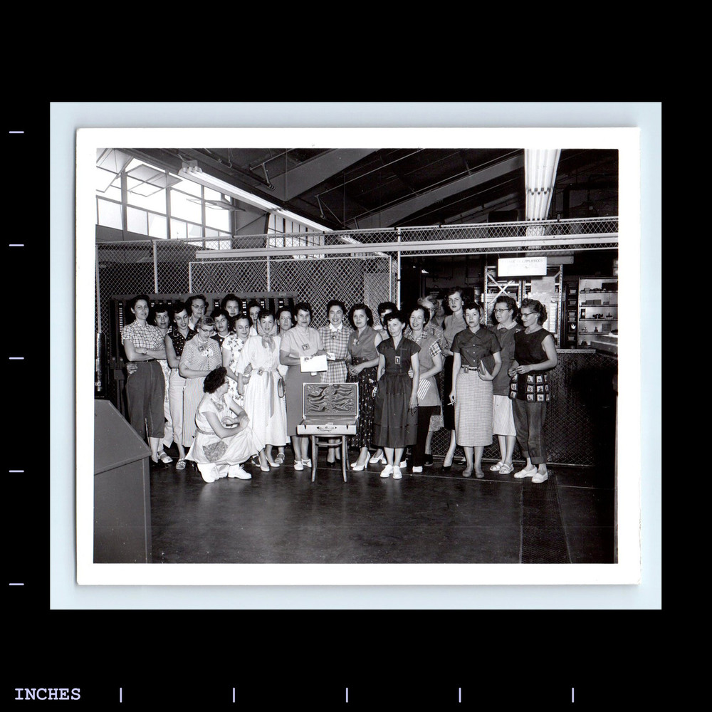 Vintage Photo WOMEN NEXT TO SUITCASE DISPLAY