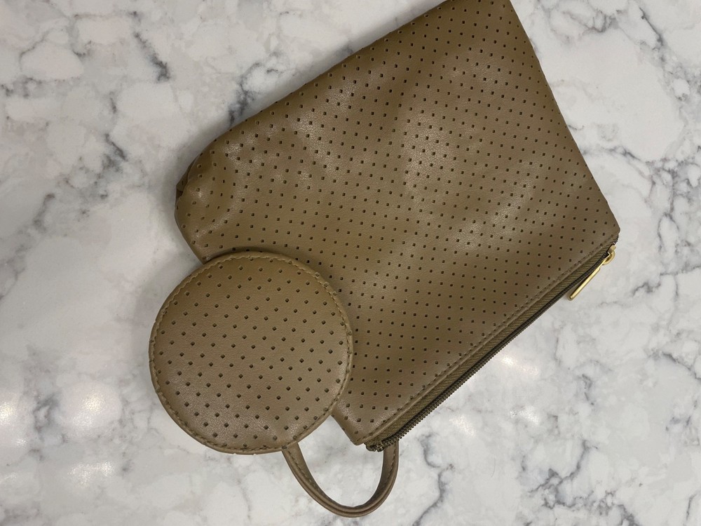 Bueno waterproof cosmetic travel bag with multiple compartments