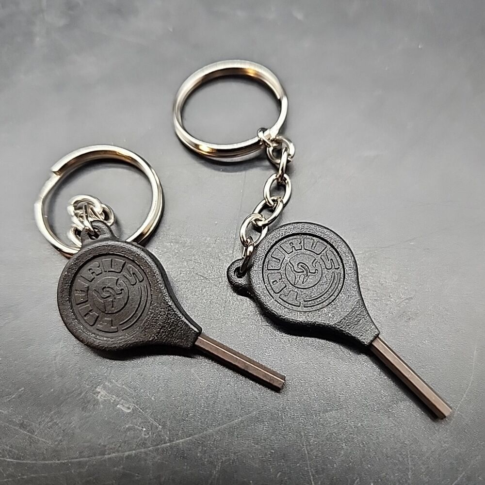 Set of 2 TAURUS Firearm Security Safety Lock Trigger Lock Keys OEM w Keychains