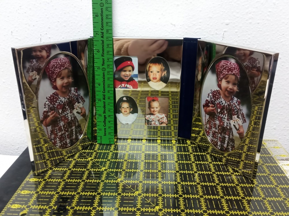 Vintage 1994 International Silver Company Trifold Photo Frame holds 6 pictures