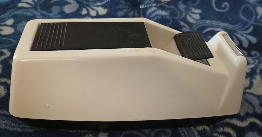 Vintage 1980s scotch tape dispenser with logo on side