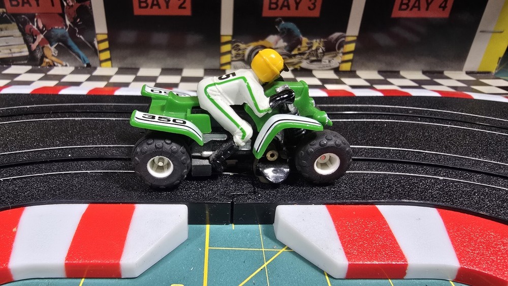 Tyco slot car #27 - Green/White - Yamaha Banshee - tested - runs