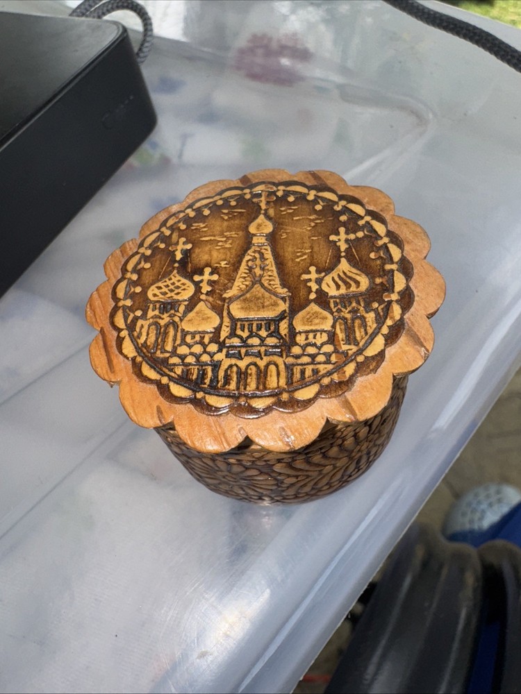 Hand-carved birch bark jewelry box with intricate detailing