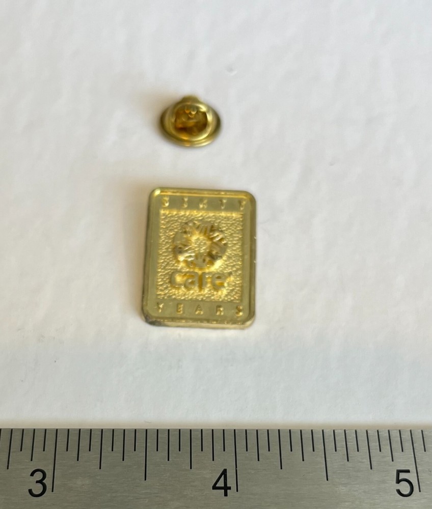 Sixty Years CARE - Gold Colored Vintage Collector Pin