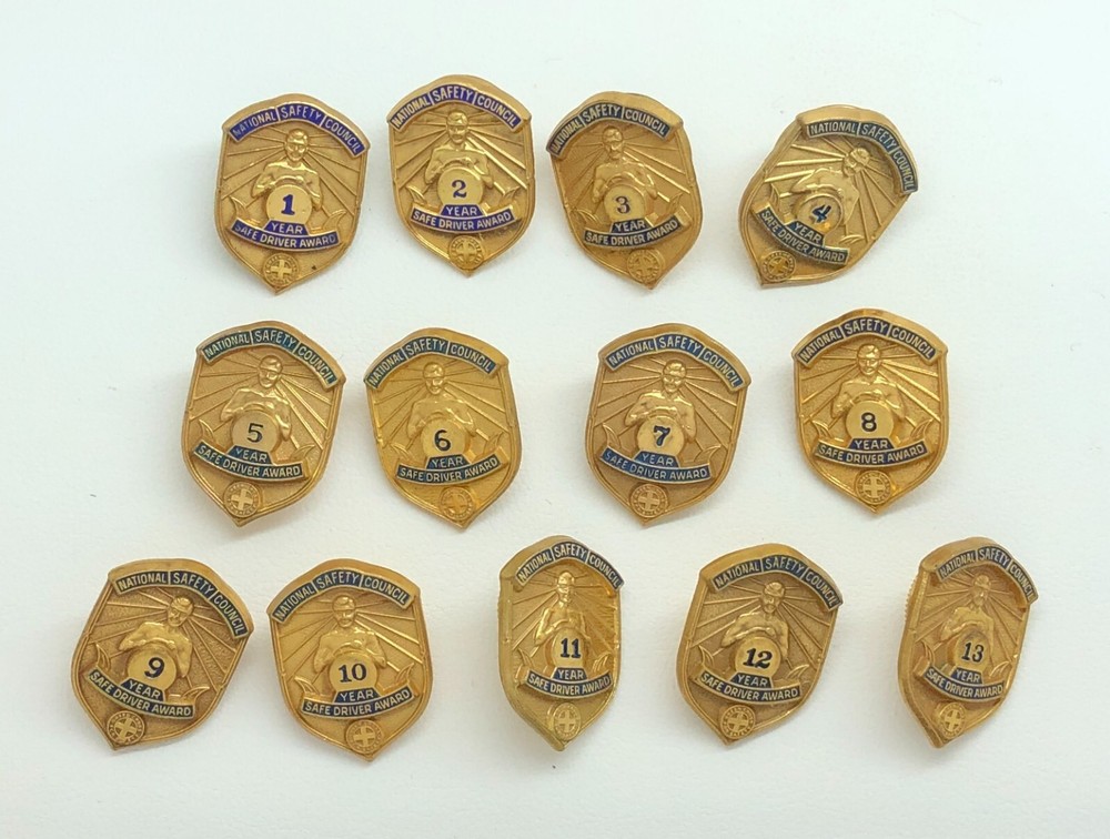 SET OF 13 YEARS NATIONAL SAFETY COUNCIL SAFE DRIVER AWARD LAPEL PINS