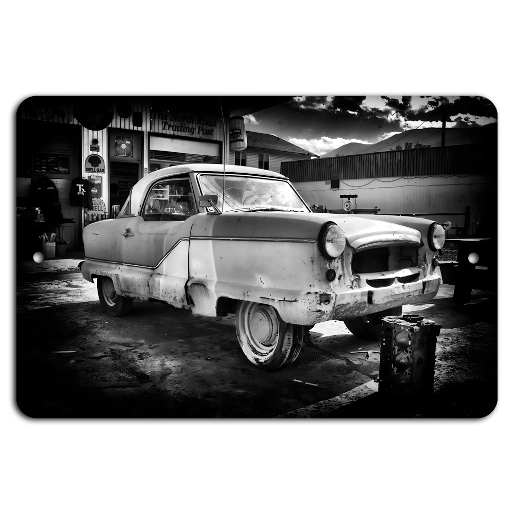 Vintage Charm: Classic Car at the Trading Post