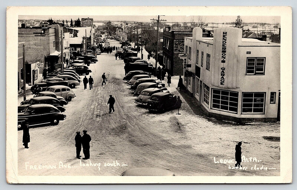 VINTAGE OLD POSTCARD PHOTO CITY STREET STORES CARS PEOPLE WINTER LEDUC, ALTA