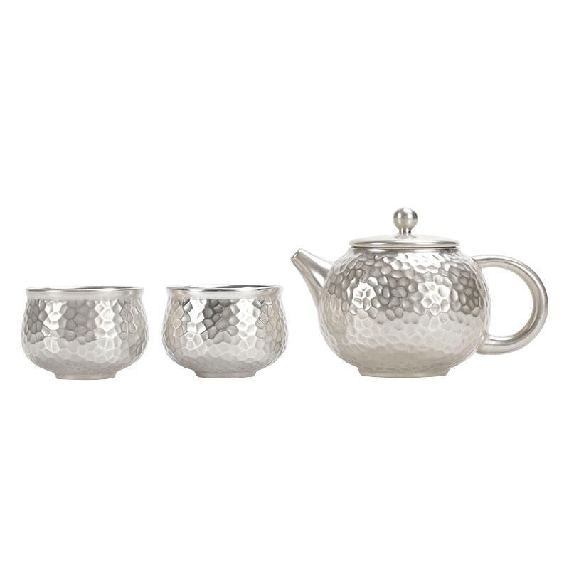 Hammered 999 sterling silver tea set with kettle and two cups