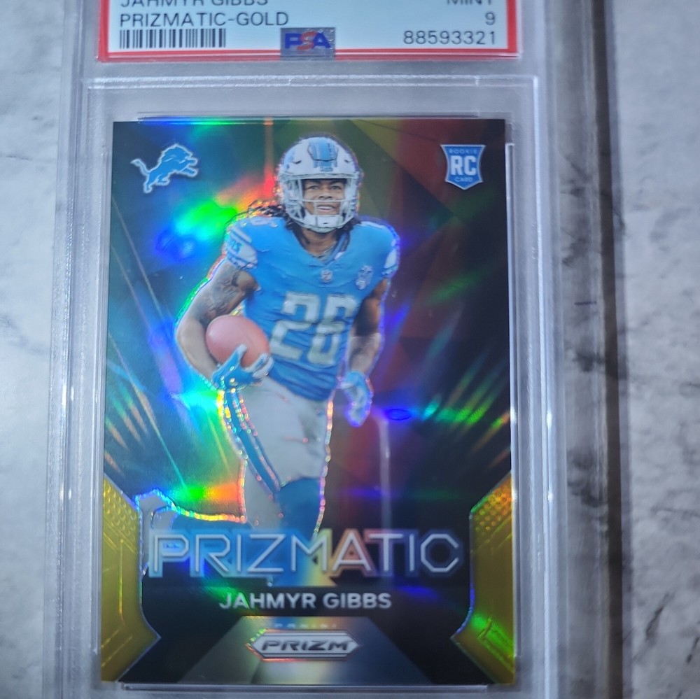 JAHMYR GIBBS- 2023 panini PRIZM GOLD #/10 🔥  PRIZMATIC GOLD /10 MINT RC ROOKIE