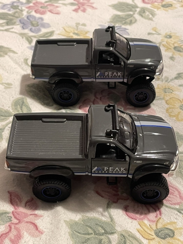 Maisto Ford F Series  Truck. 1:46 Scale Die Cast Gray Peak Suspension. Lot Of 2
