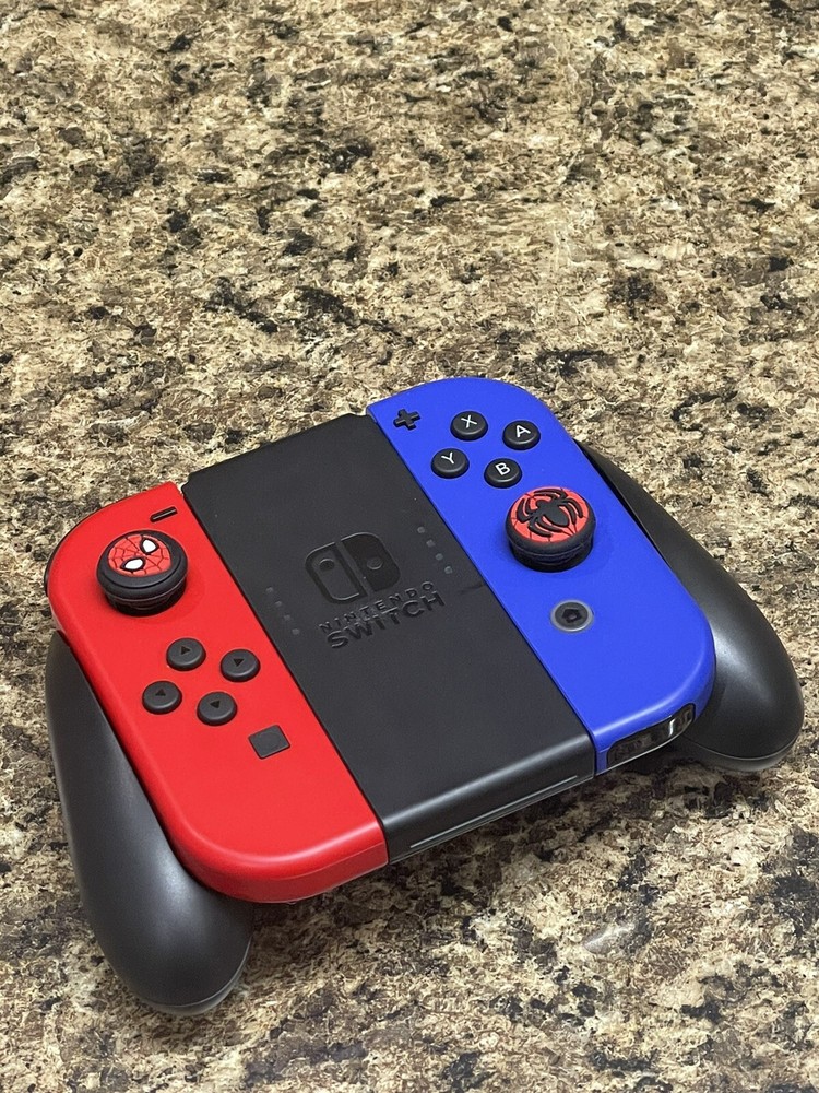 Nintendo Switch Joy Con Controllers Purple/Blue & Red (L/R) - OEM Set With Grip