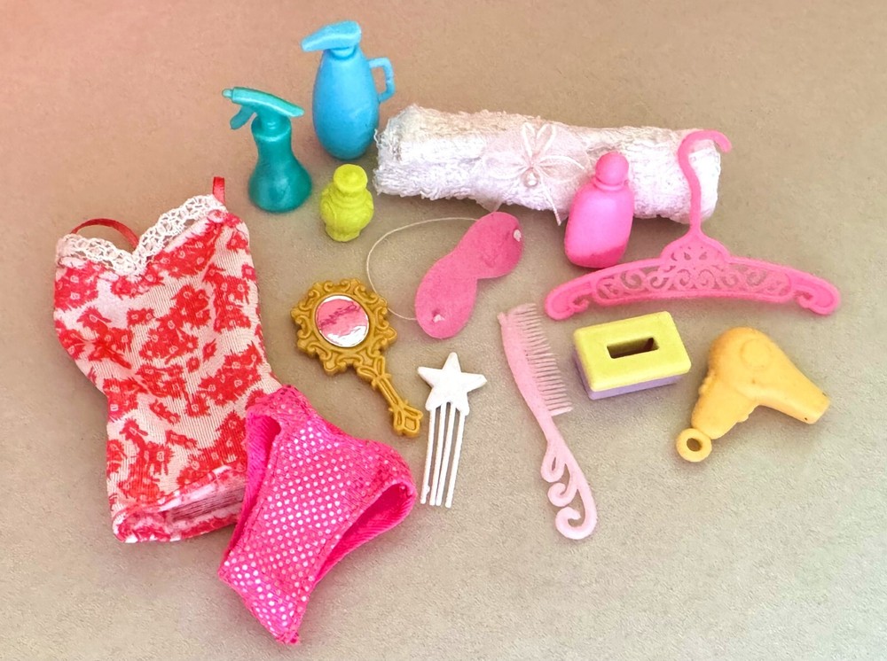 Linda muñeca Barbie glamour y accesorios para el cabello