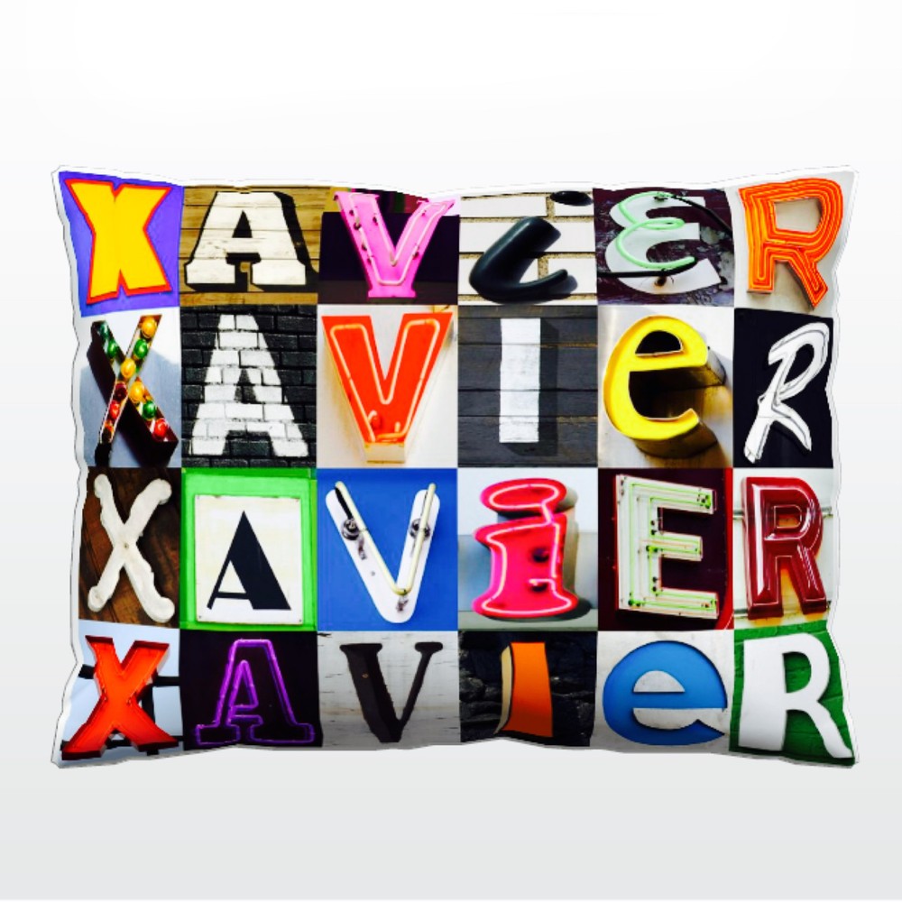 Personalized Pillow featuring the name XAVIER in photos of actual sign letters