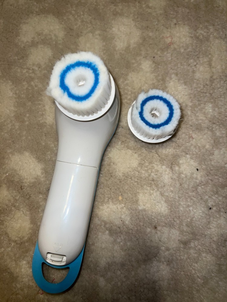 clarisonic powered face wash brush, with attatchment