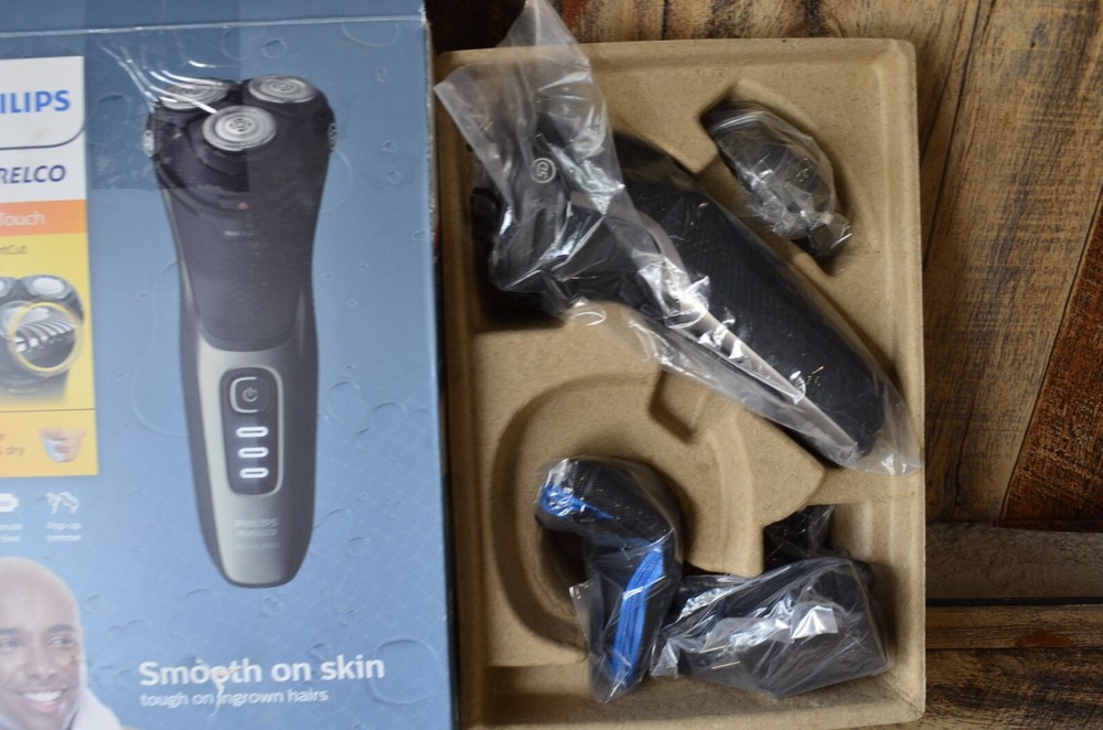 Philips Norelco CareTouch Rechargeable Wet Dry Electric Shaver with Pop-Up Trimmer