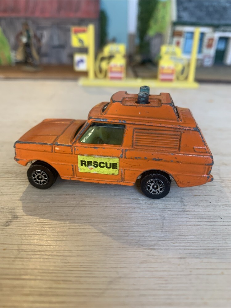 CORGI JUNIORS RANGE ROVER POLICE RESCUE TEAM ORANGE DIE-CAST TOY CAR