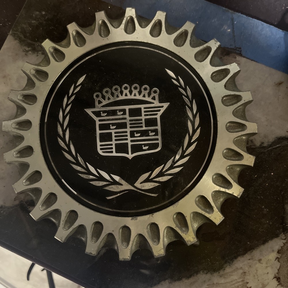 1993-97 Cadillac Deville Wheel Center Cap.Genuine OEM ONE piece