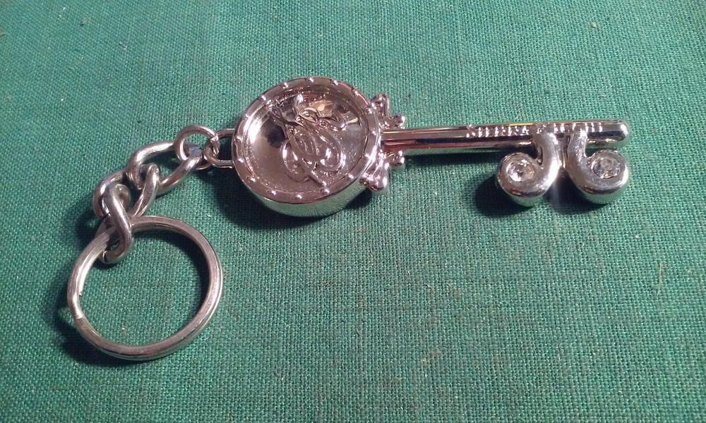 Sienna Ricchi keychain Key shape silver tone key fob pull tag tab Silver-Tone