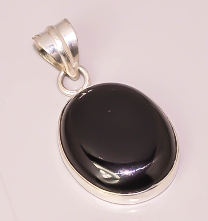 Natural Black Onyx Oval Pendant in 925 Sterling Silver Plating