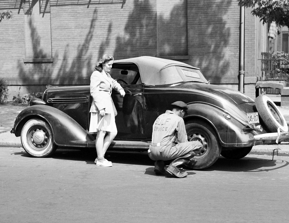 1942 Vintage Tire Change Photo 8.5x11 Reprint of Stranded Girl