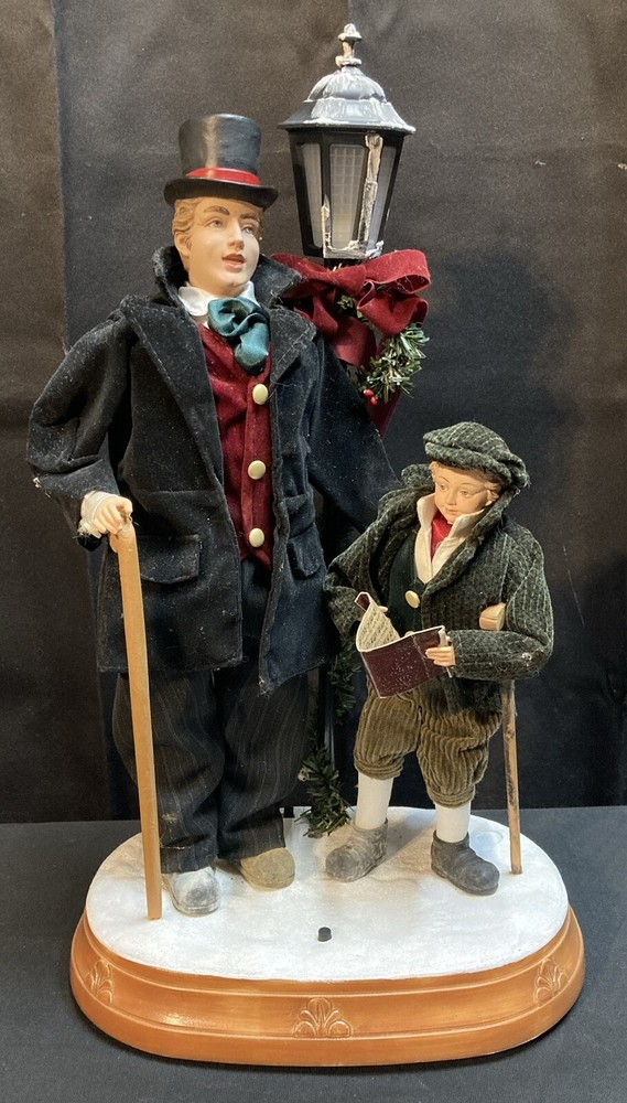 17-Inch Lighted Musical Dickens Christmas Table Decor with Silent Night Melody  