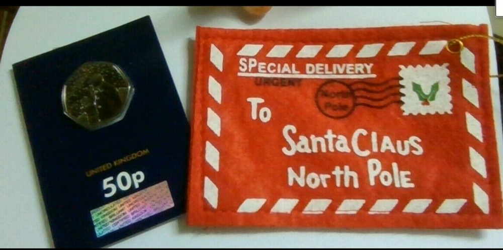 2021 Snowman 50p Brilliant Uncirculated Coin in Red Santa Felt Envelope