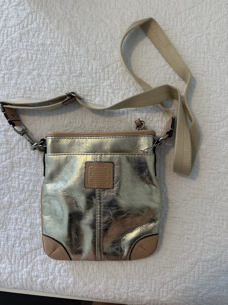 Coach gold-tone crossbody bag with chain strap