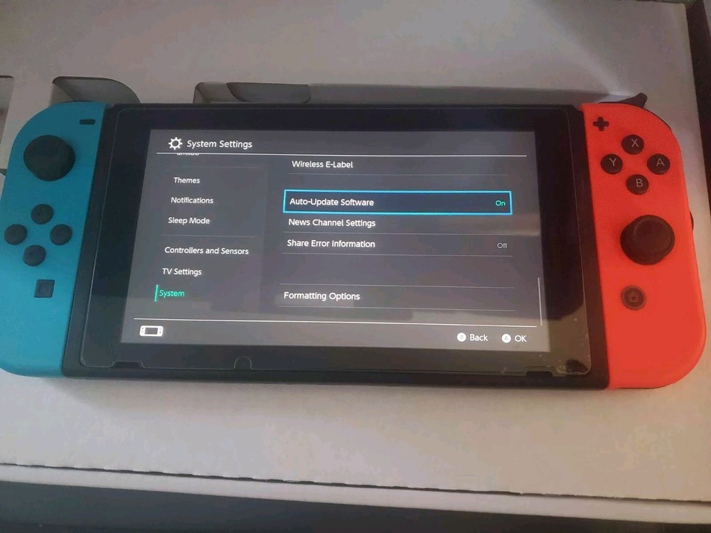 Nintendo Switch 32GB Handheld Console - Neon Red/Neon Blue - With 128GB SD Card