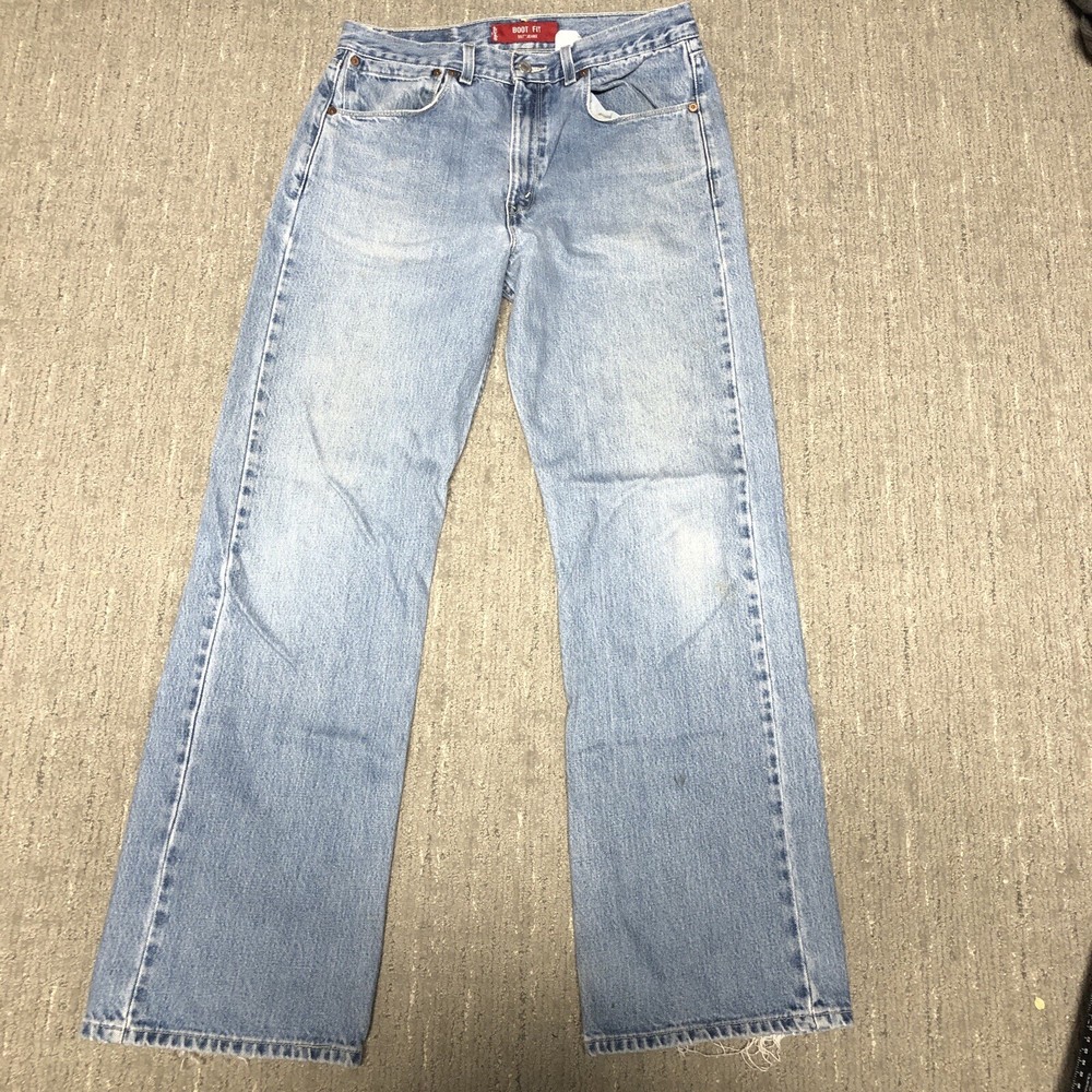 Vintage Levi’s 557 Relaxed Boot Fit Jeans Men Size 33x32 Blue Faded Y2K Western