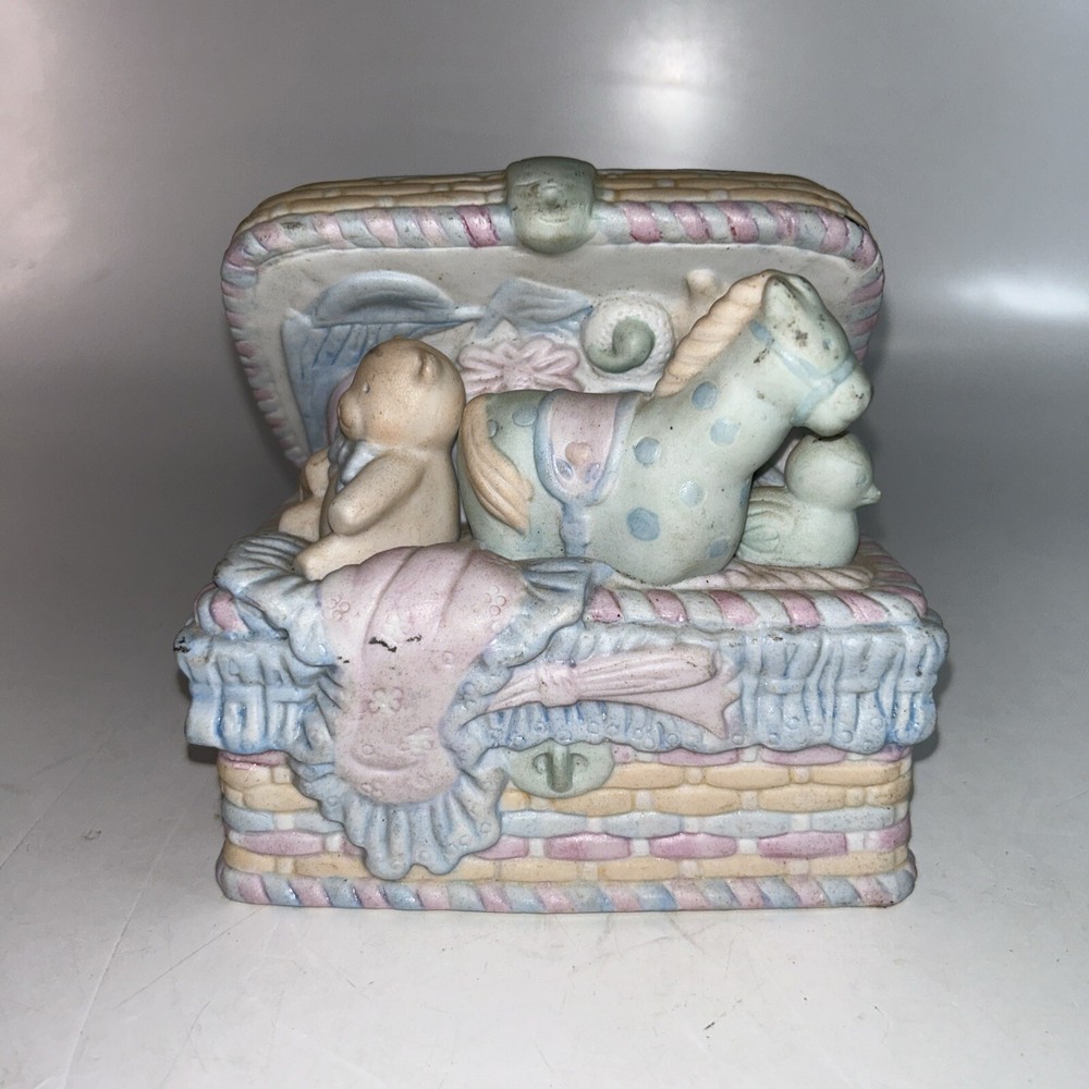 Musical Toy Chest with Decorative Statuette