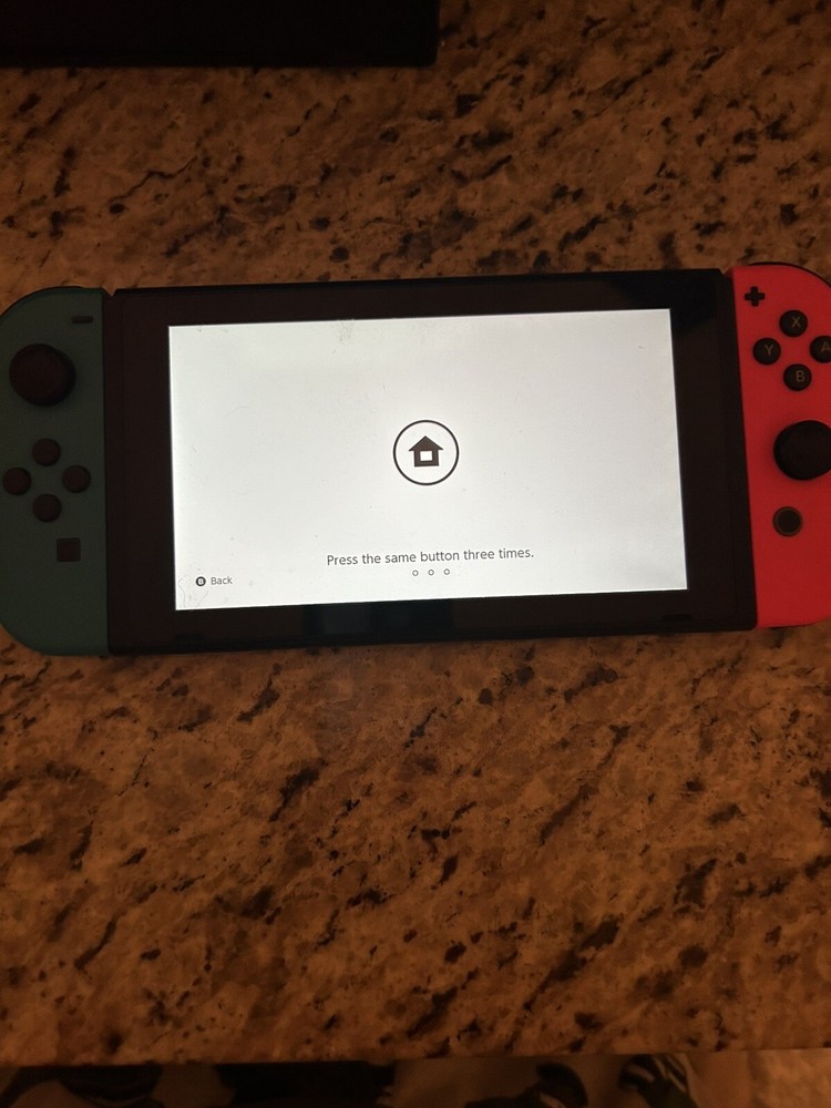 Nintendo Switch with Neon Blue and Neon Red Joy-Con and Super Smash Bros Game