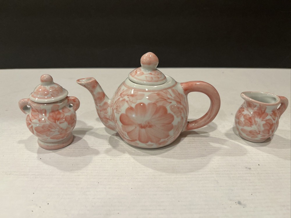 Miniature Red Floral Porcelain Teapot Pitcher and Sugar Bowl Set