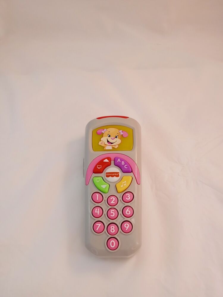 Fisher Price Laugh and Learn Puppy's Remote Baby Toy 35+ Songs & Sounds 6-36 M