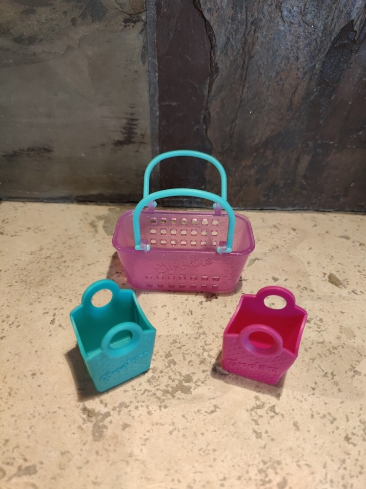 3 Shopkins shopping baskets: 1 pink sparkly w/green handles, small green & pink
