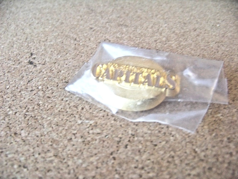 Washington Capitals gold tone hockey puck lapel pin NHL