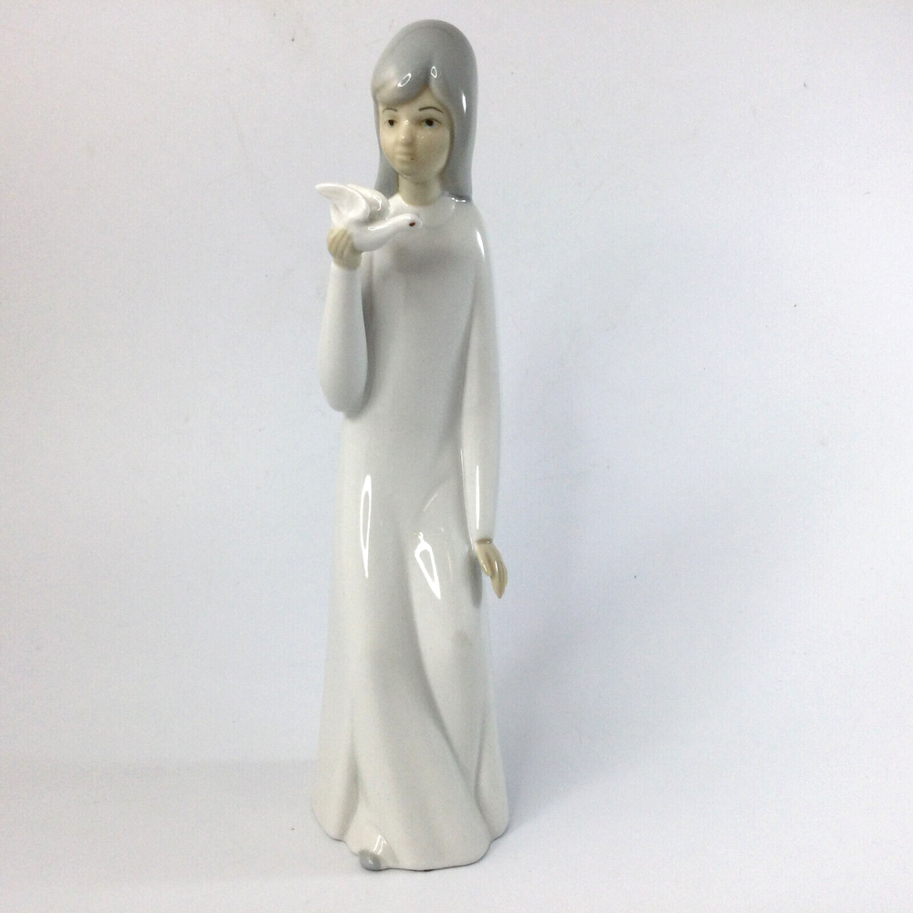 Miquel Requena Porcelain Figurine of Woman in White Dress with Grey Dove Valencia Spain Handcrafted Elegance