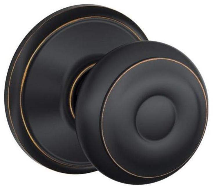 Schlage F10-GEO Georgian Passage Door Knob Set in Aged Bronze