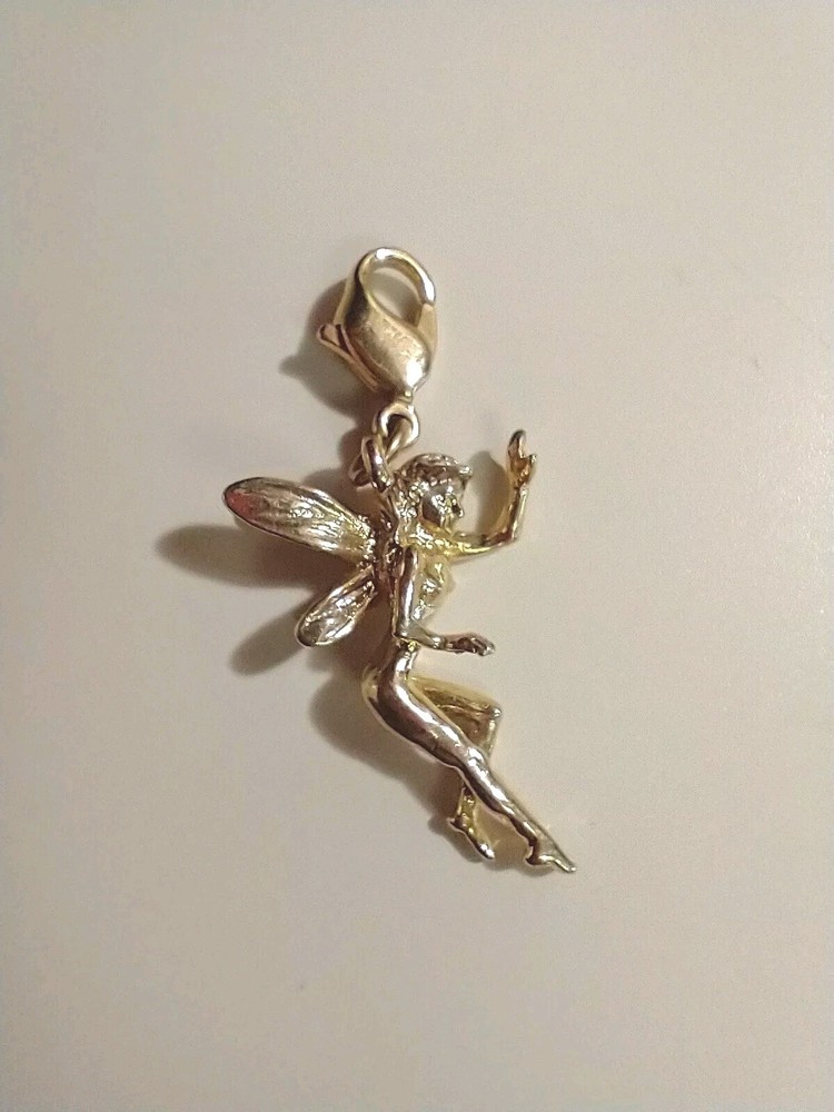 Vintage Kirks Folly Gold Tone Waving Fairy Charm Retired
