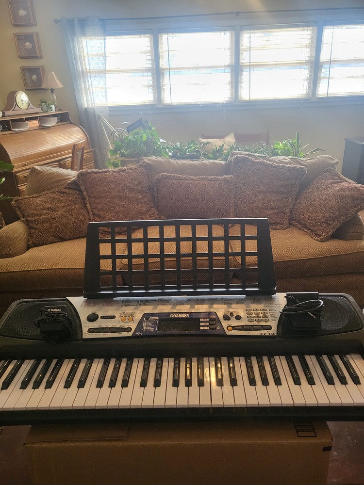 Yamaha EZ-200 61-Key Full-Sized Touch Sensitive Portatone Electronic Keyboard