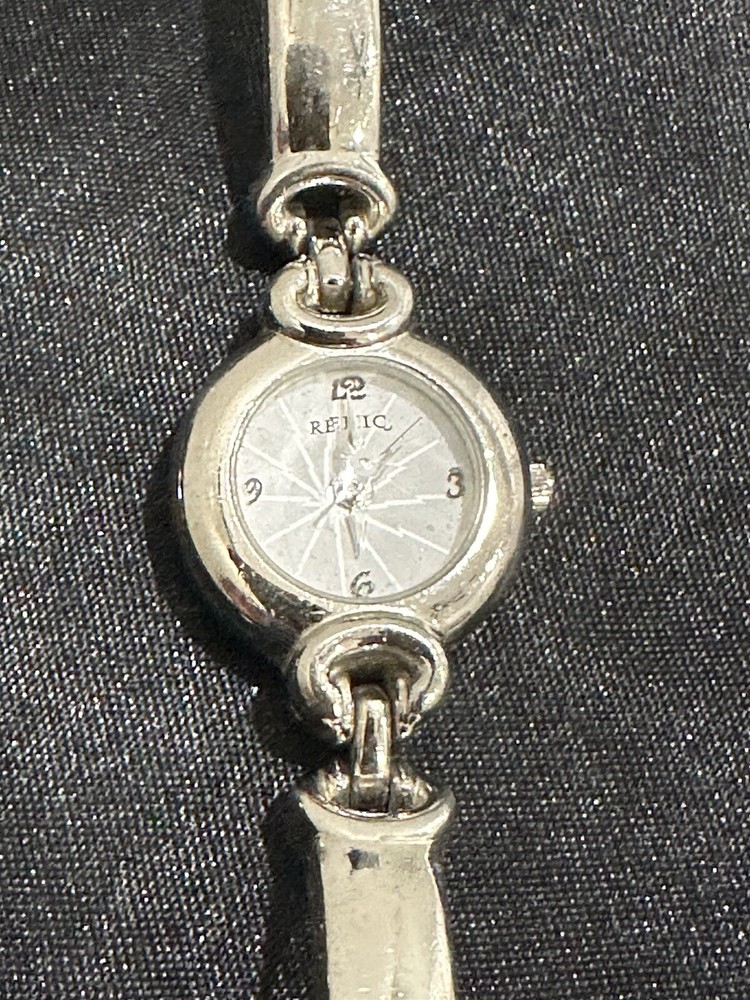 Relic White Dial Raised Prism Crystal Round Silver Tone Women’s Watch